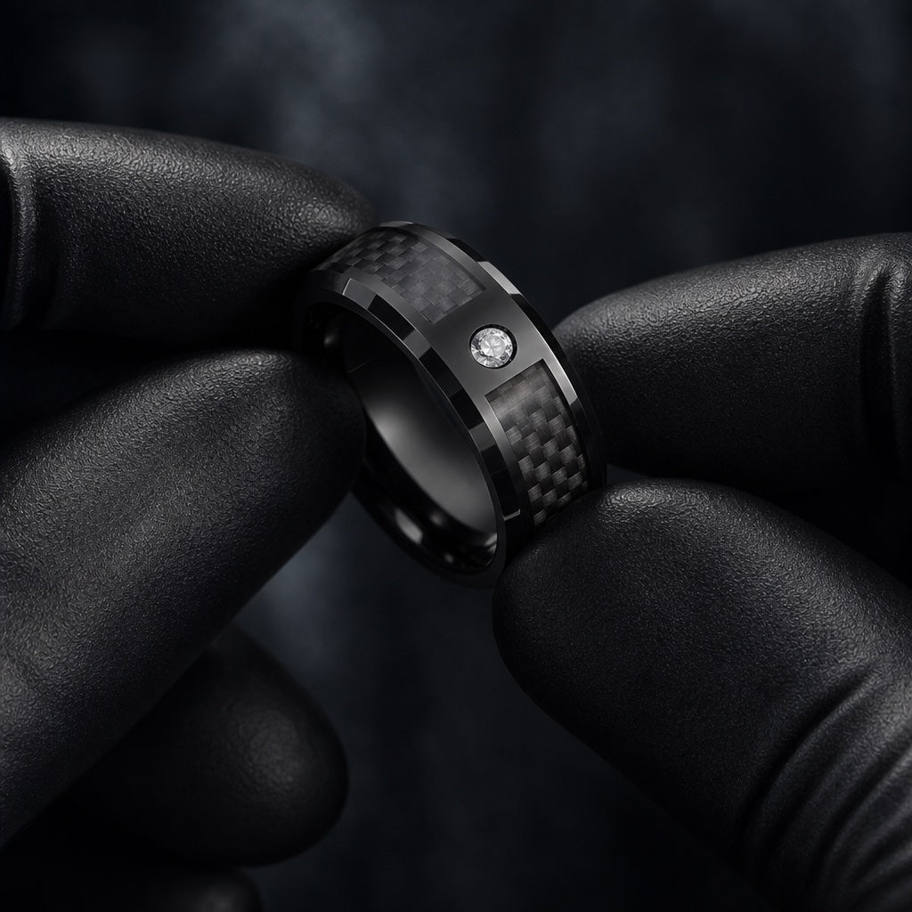 Gloved hands presenting the Agile ring, carbon fibre inlay, bevelled edges and comfort-fit curve visible