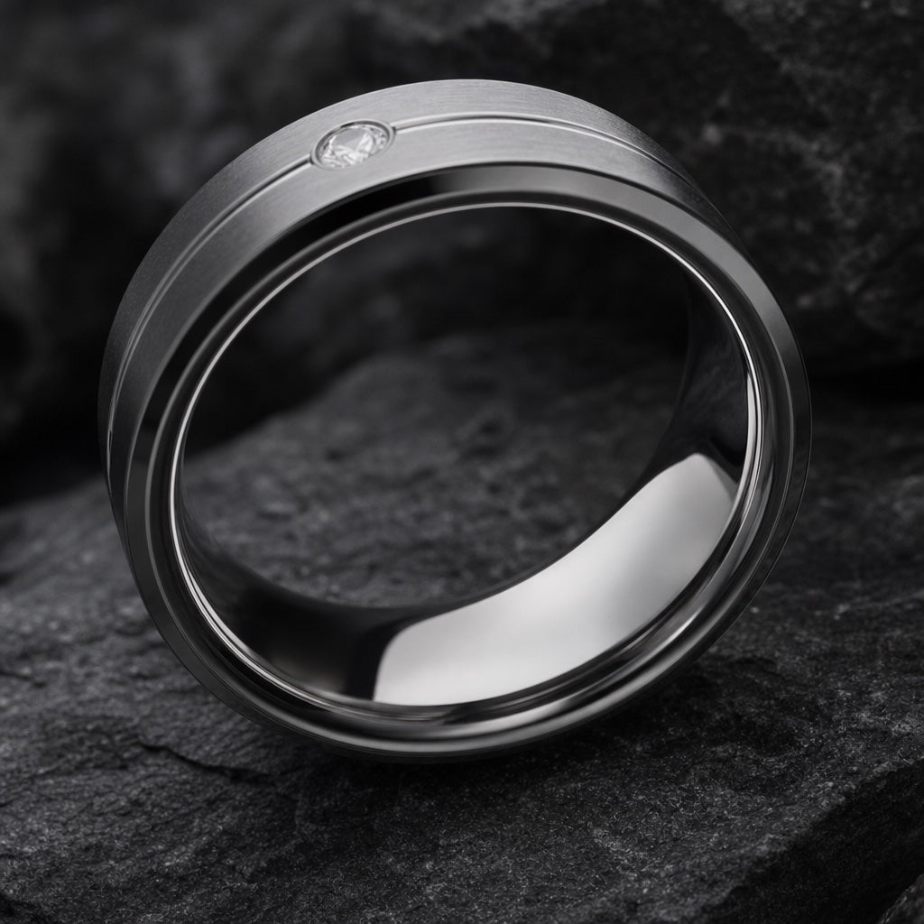 Arctic ring angled on dark charcoal stone to fill the frame with blank polished silver interior