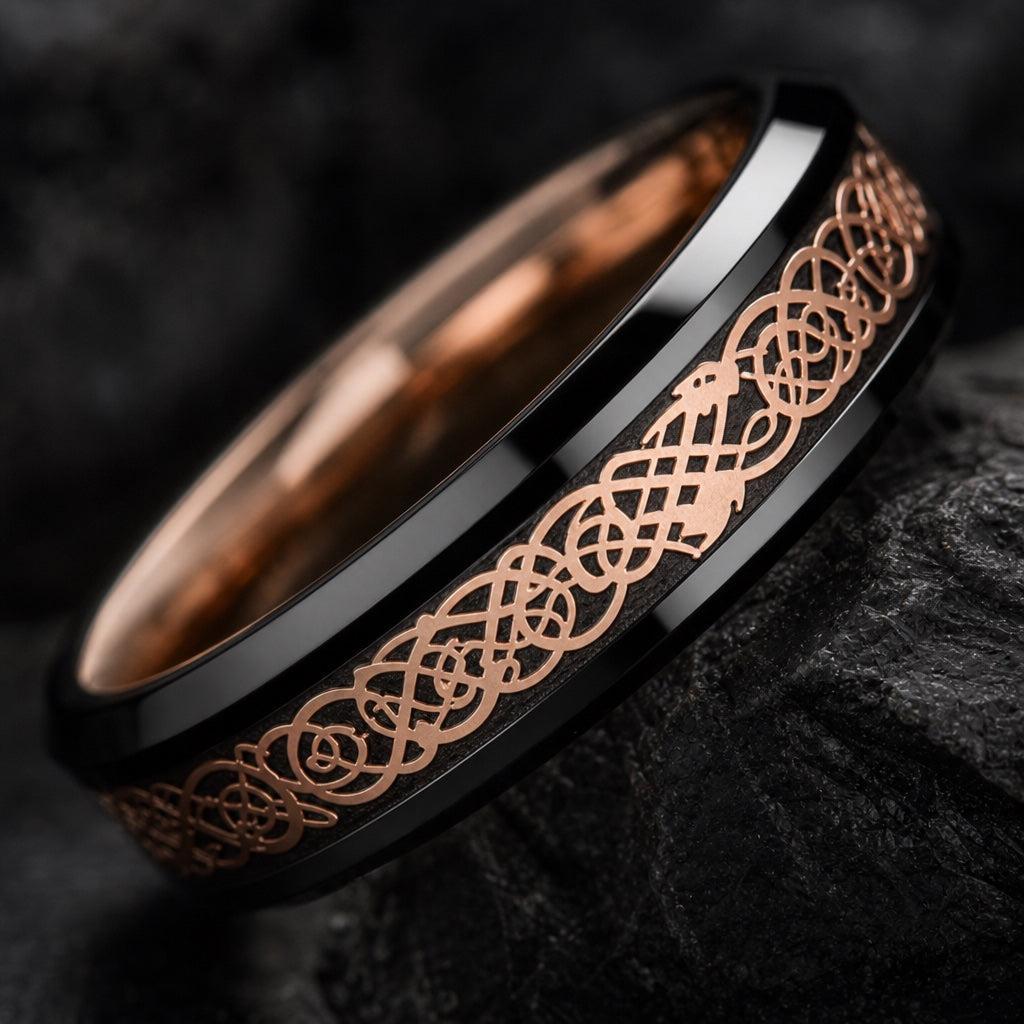 Macro of the Basilisk ring's rose-gold dragon-scale Celtic knot filigree on dark ground