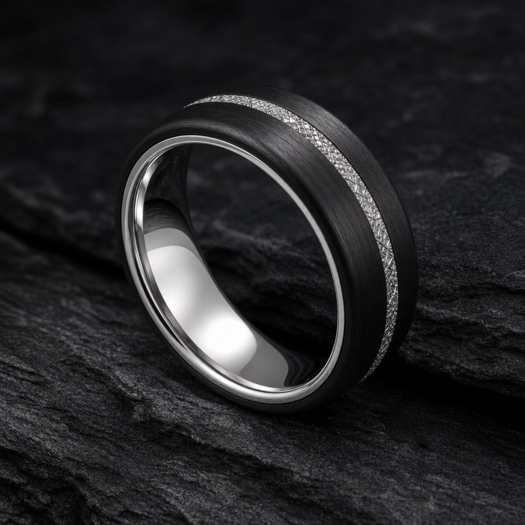 Comet ring angled to show the polished silver interior of the band