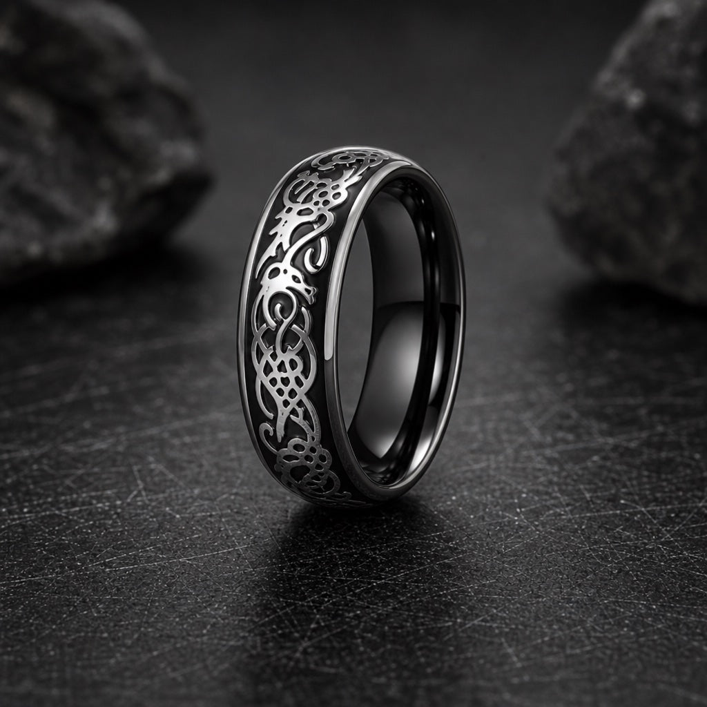 Drago ring showing round domed profile and polished silver outer rails on black band