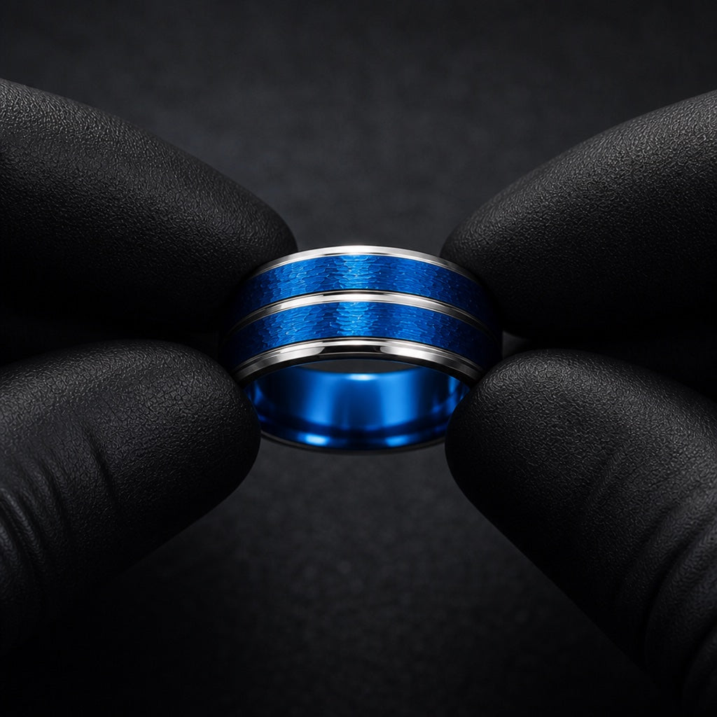 Gloved hands presenting the Dynamo ring, stepped edges and twin silver rails visible