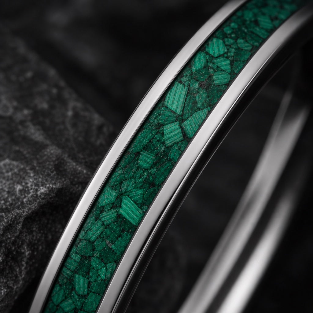 Macro of the Oracle ring crushed green malachite inlay in polished silver