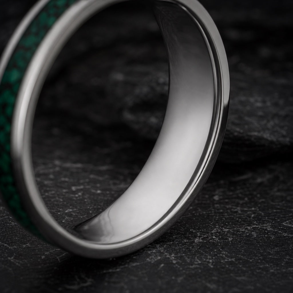 Oracle ring angled to show blank polished silver interior on dark stone