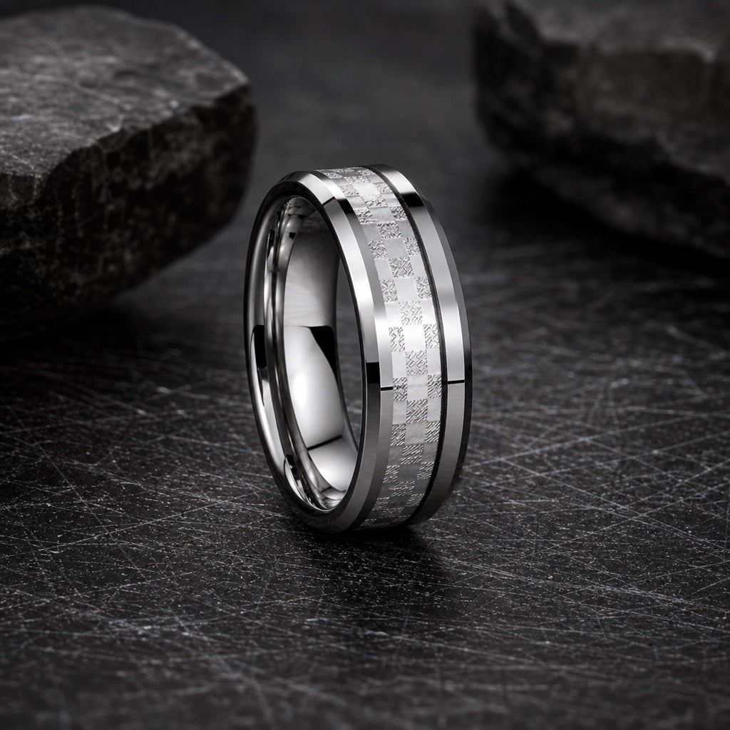 Shimmer ring showing polished silver bevelled edges framing the centred checkered shimmer channel against dark charcoal stone