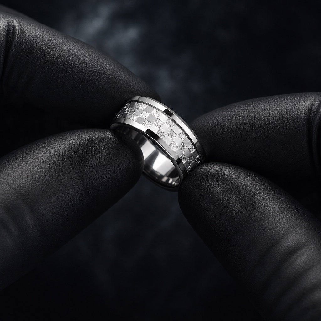 Gloved hands presenting the Shimmer ring, polished bevels and centred checkered silver shimmer channel visible