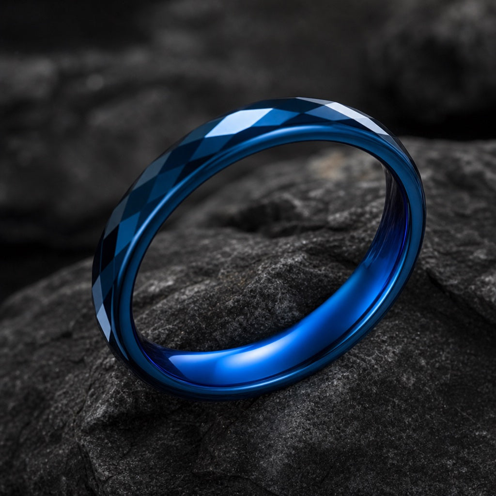 Virtue ring angled on dark stone to show the polished electric-blue interior of the band