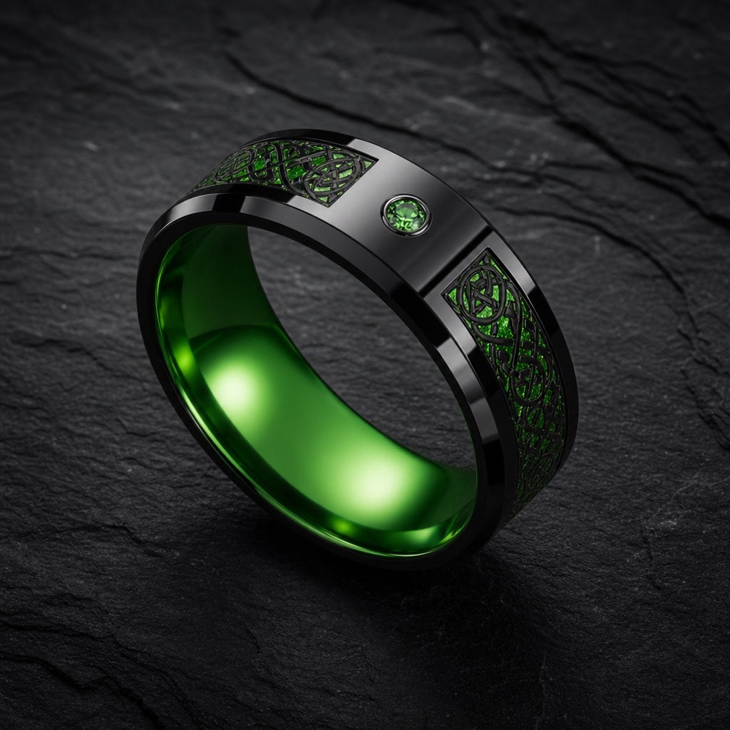 Wildcard ring angled to show the polished emerald green interior of the band on dark stone