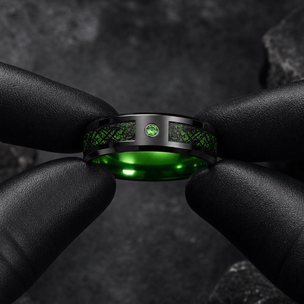 Gloved hands presenting the Wildcard ring, comfort-fit curve and green filigree face visible