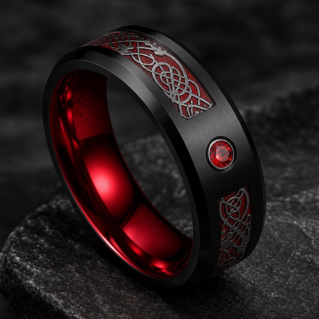 Cardinal ring angled on dark charcoal stone to show the polished metallic red interior of the band