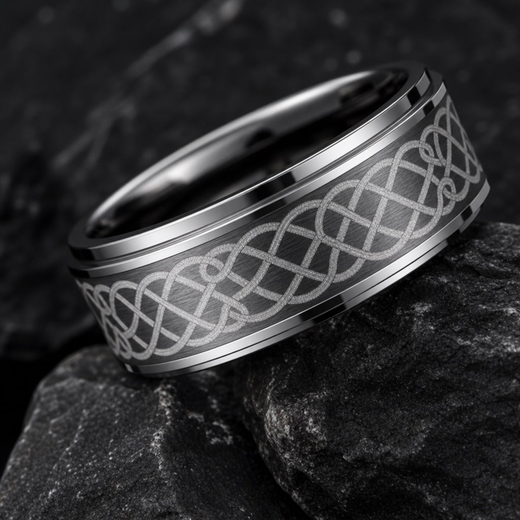 Macro of the Celtic ring's continuous knot engraving on silver tungsten