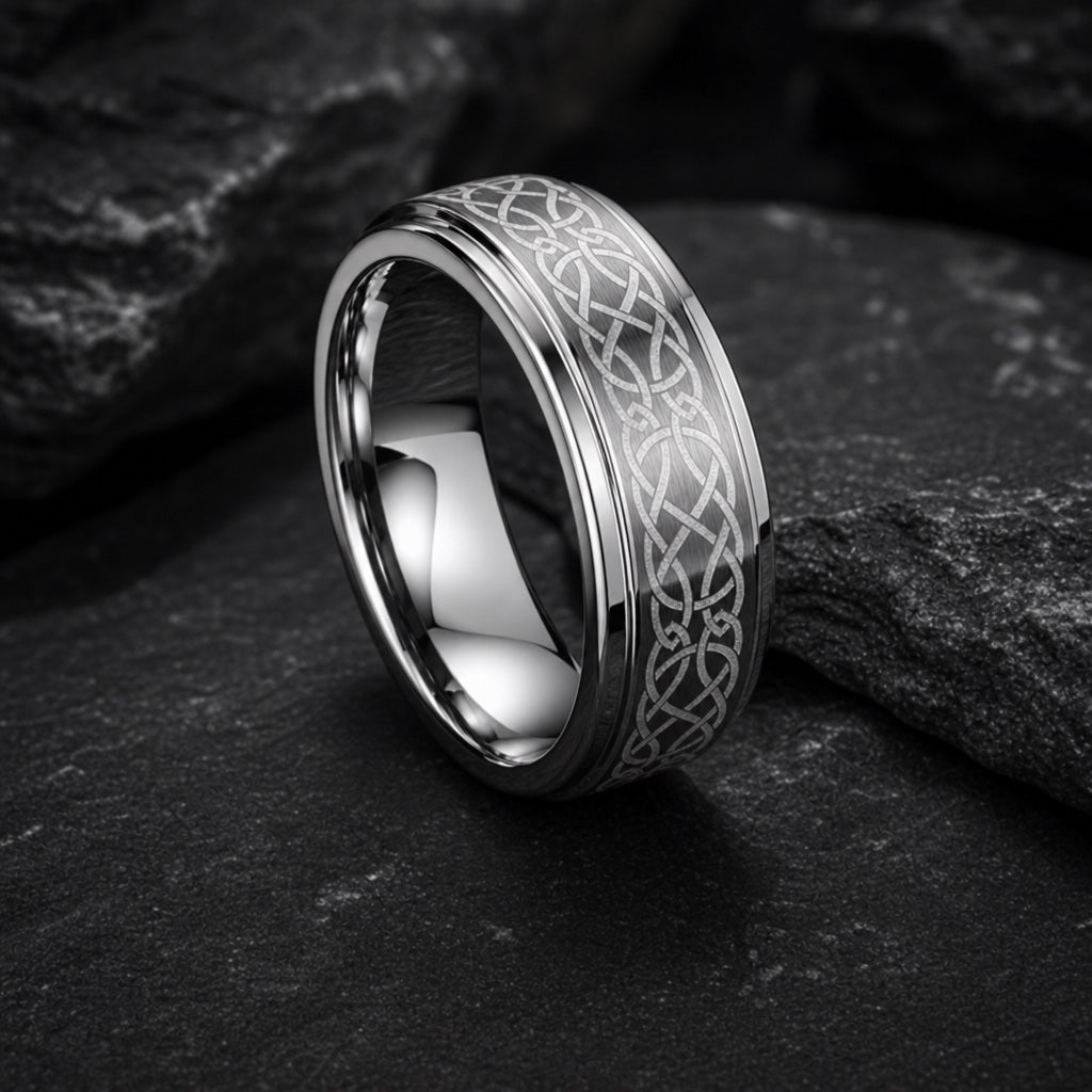 Celtic ring angled to show the polished silver interior of the band