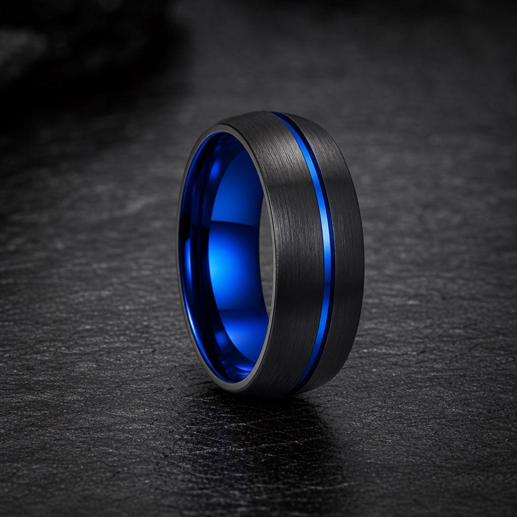 Cyclone ring showing brushed black tungsten face and soft-domed round edges with centred blue line