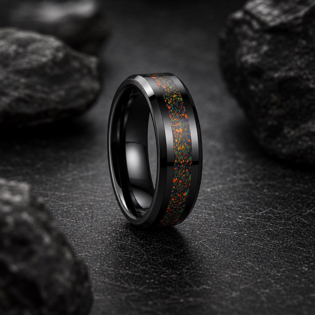 Divine ring showing polished black bevelled outer rails against the centred opal fire channel on dark stone