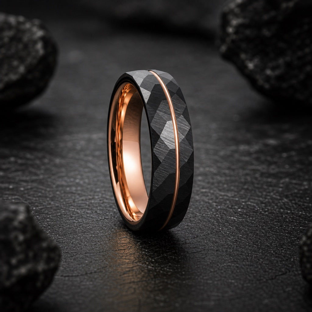 Kingpin ring standing on dark charcoal stone showing polished rose-gold interior and offset rose-gold line
