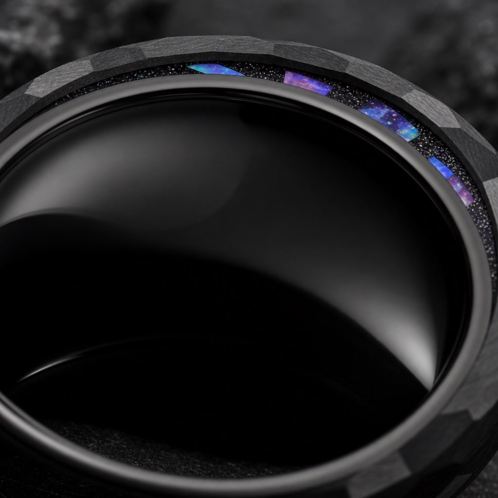 Magus ring angled to show blank polished black interior on dark charcoal stone