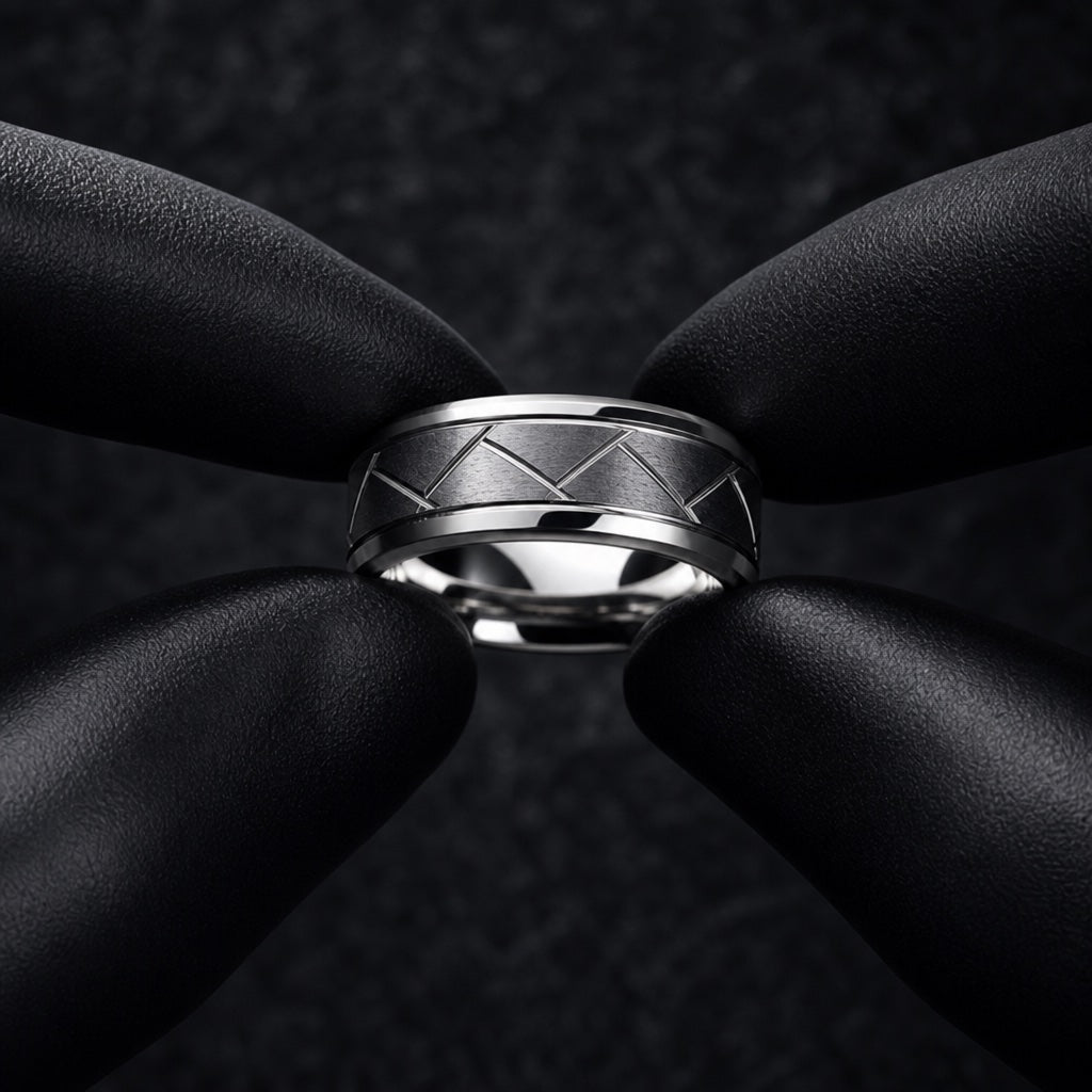 Gloved hands presenting the Pioneer ring, lattice face, bevelled rails, and comfort-fit curve visible