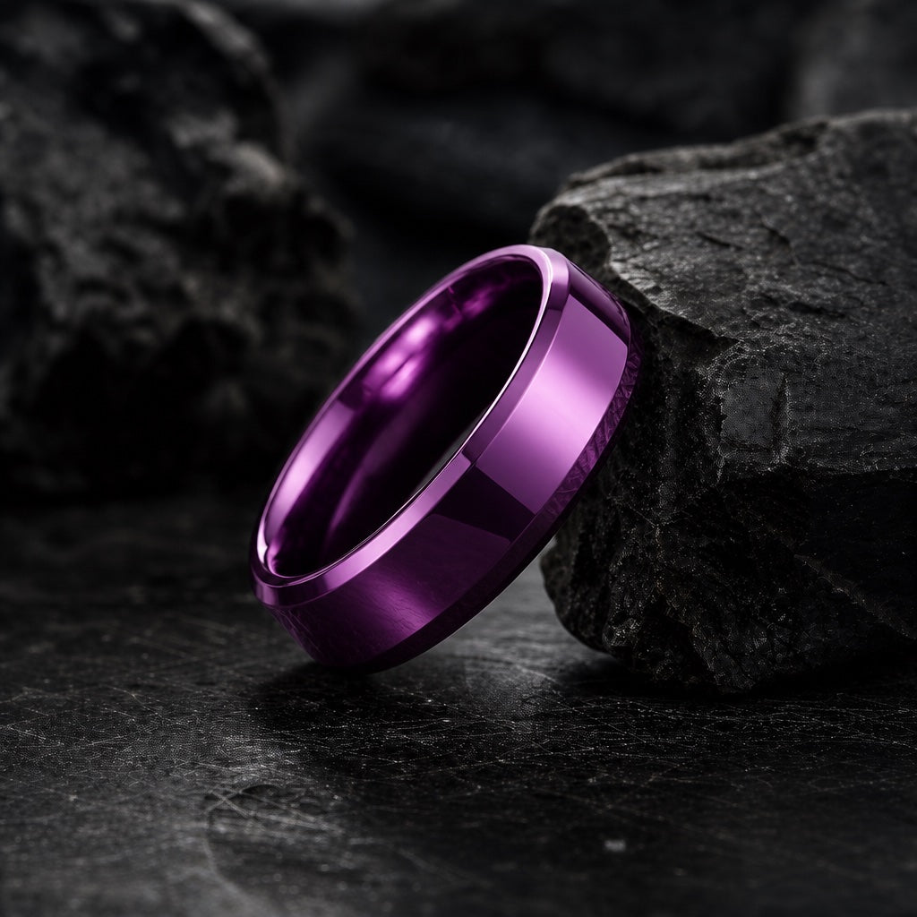 The Royal ring resting against dark charcoal rock, solid polished purple body and bevelled edges visible