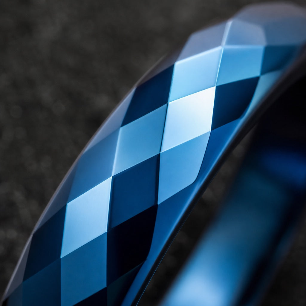 Macro of the Virtue ring's diamond-cut faceted electric-blue exterior