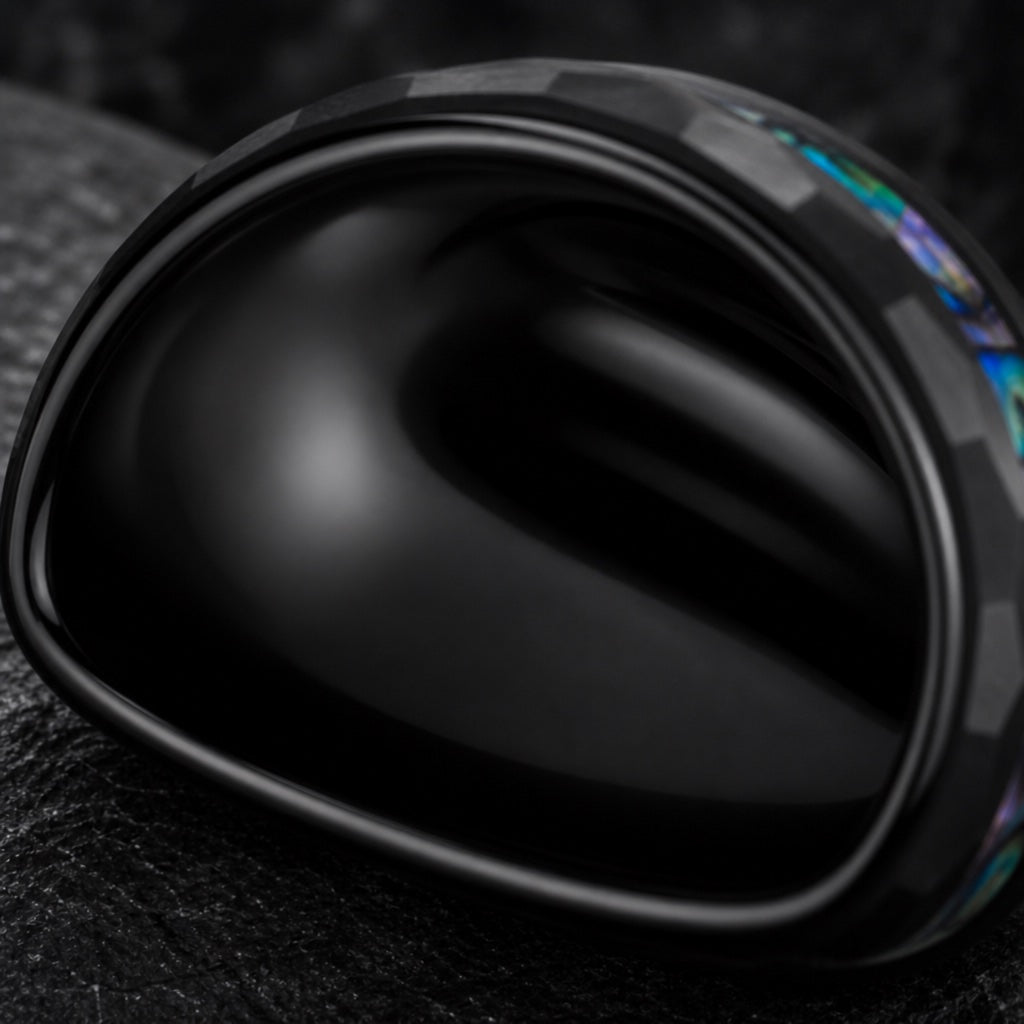 Warlock ring angled to show blank polished black interior on dark charcoal stone