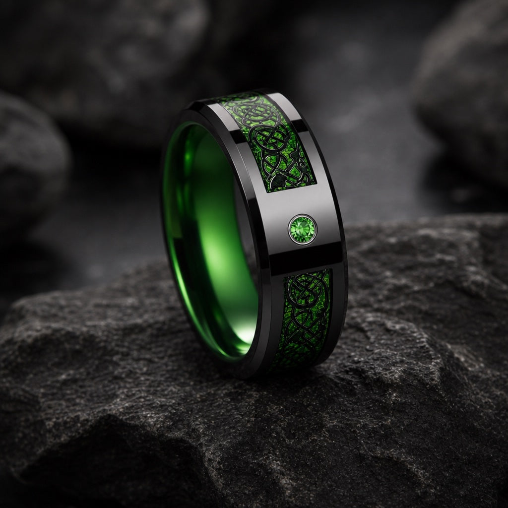 Wildcard ring showing polished black bevelled edges and green filigree face